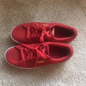 Red puma shoes